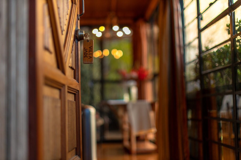 Villa Jade room entrance with wooden door and tag