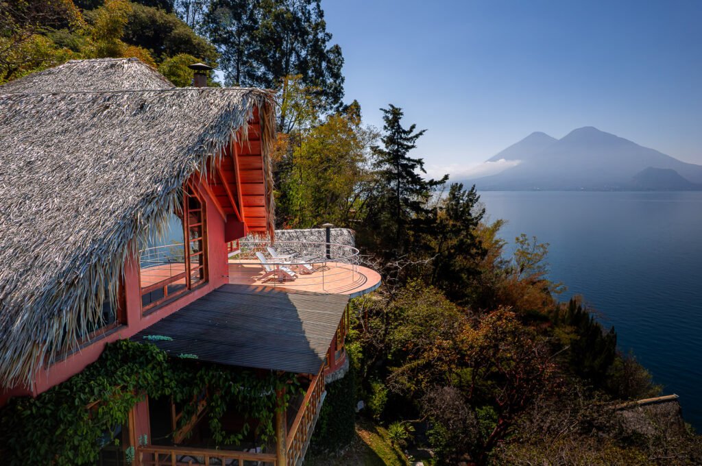 Lake Atitlán villa with thatched roof and mountain views
